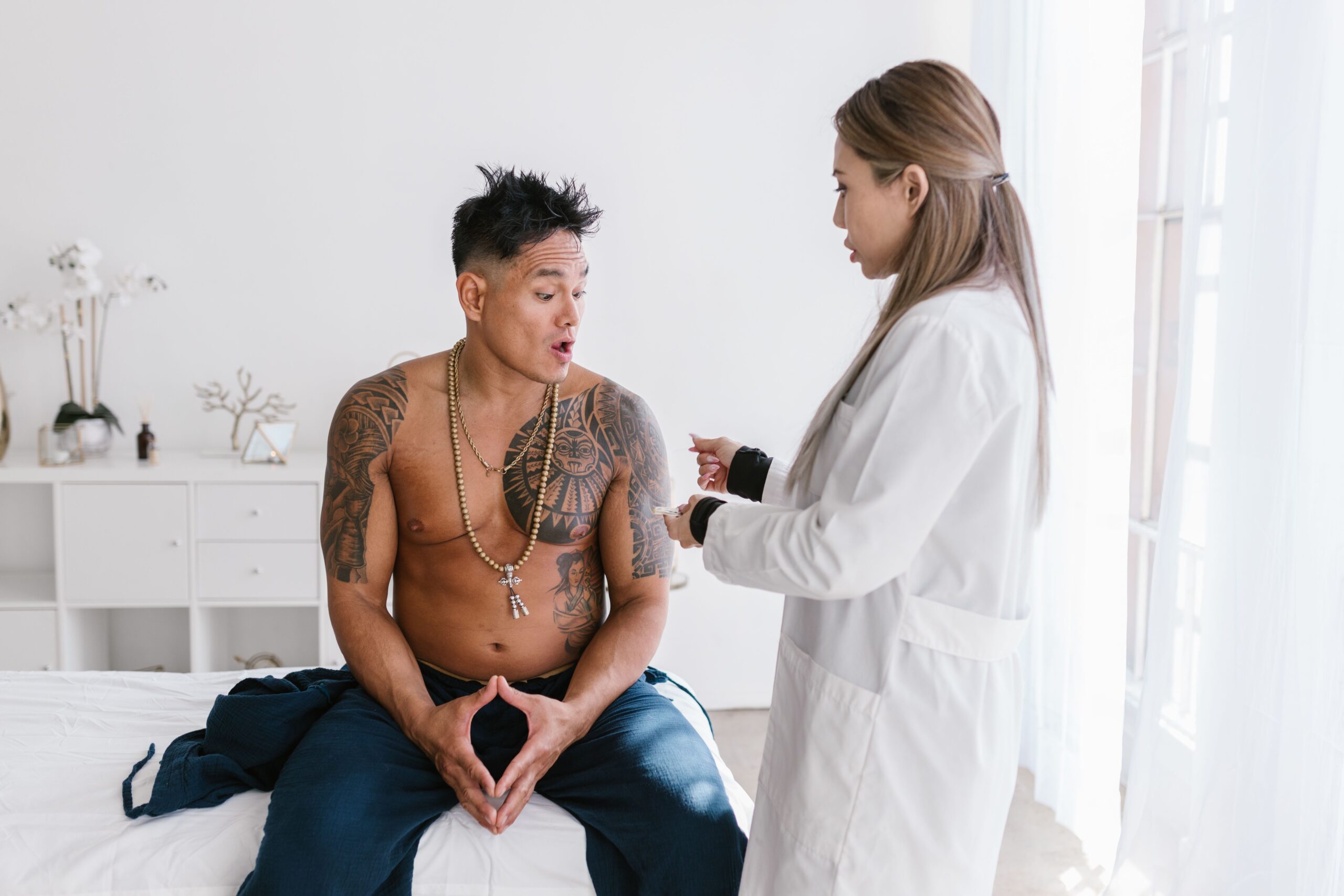 A patient meeting with their care provider